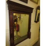 Late 19th or early 20th Century Continental oak wall mirror,