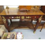 19th Century figured mahogany and gilt brass mounted console table of French Empire design,