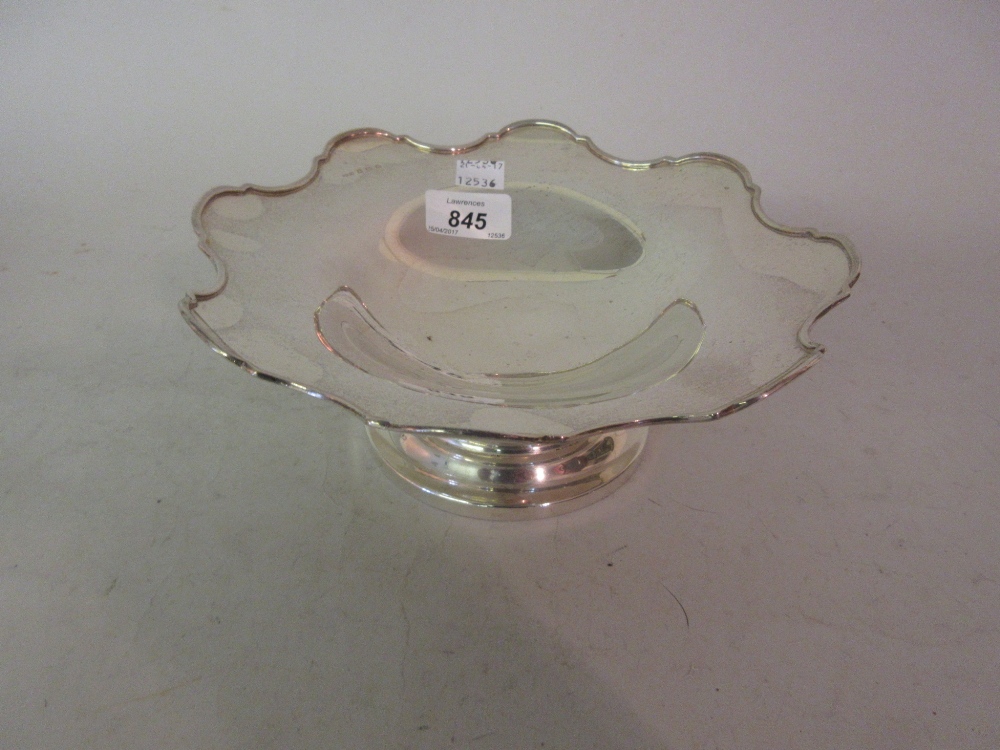 Birmingham silver circular pedestal dish having shaped edge