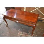 Rectangular reproduction mahogany and crossbanded coffee table on cabriole supports