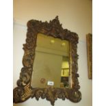 Small 19th Century ghesso wall mirror with scroll surmount