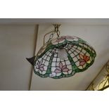 Reproduction leaded glass hanging lamp shade together with a similar smaller lamp shade