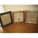 19th Century alphabet sampler by Petra Miguelanez with floral border,