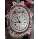 19th Century German porcelain wall clock having floral decoration and enamel dial with Roman