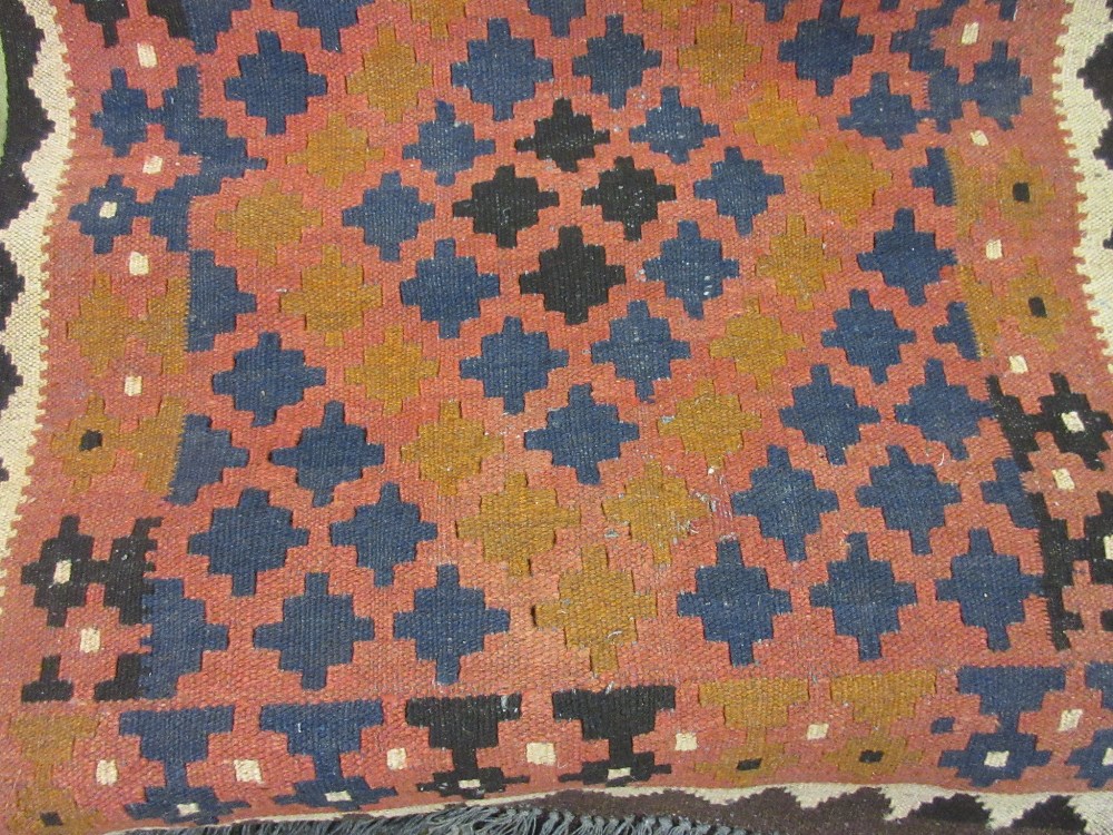 Small Kelim rug with a hooked medallion design together with a small Kelim runner