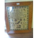 19th Century sampler with verse and figure playing a harp with various trees,