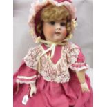 Schoenau and Hoffmeister bisque headed doll with jointed body,