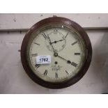 Small circular rosewood cased dial clock, the painted dial signed J.H.