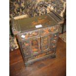 19th Century Japanese lacquer table cabinet with an arrangement of small drawers and cupboard doors