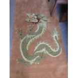 Modern Nepalese rug with dragon design on a beige ground