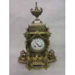 Large 19th Century French gilt brass mantel clock of ornate pagoda design with an urn surmount