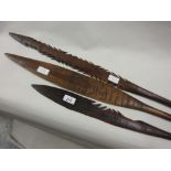 Group of three various South Seas native hardwood spears