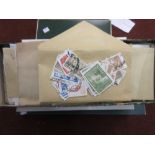 Three boxes containing collections of World stamps, South American and U.S.A.