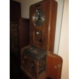 German oak cased Isgus two train time recorder clock with circular silvered dial and Arabic
