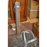 Pair of wooden and cast iron tennis net posts with net