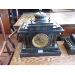 19th Century French black slate metal mounted two train mantel clock with visible escapement