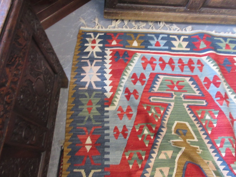 Kurdish Kelim rug with a lobed medallion design in shades of red, green and blue, - Image 4 of 5