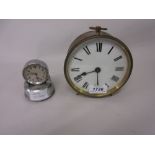 French circular brass cased drum clock with enamel dial and Roman numerals,
