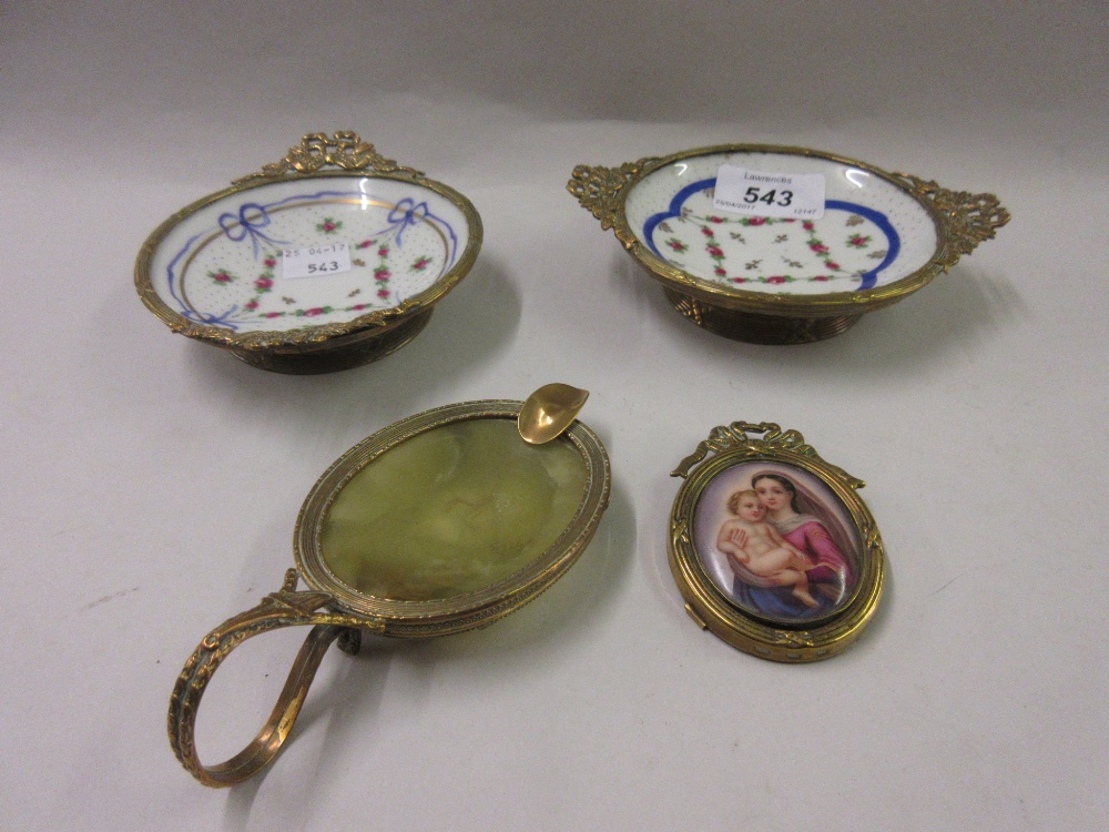Pair of small Continental porcelain dishes with gilt brass decoration together with a similar brass