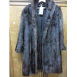 Ladies three quarter length dark brown fur coat