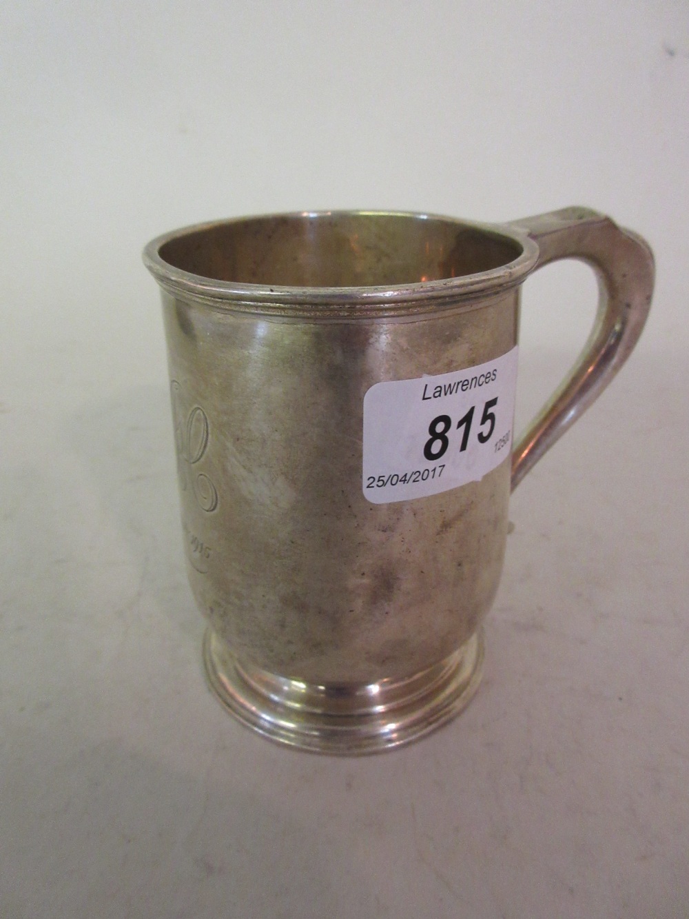 Birmingham silver mug of plain tapering form with shaped handle in 18th Century style
