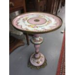 19th Century Continental porcelain and ormolu mounted circular pedestal wine table,