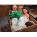 Box containing a quantity of various 20th Century injection moulded dolls together with a quantity