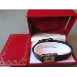 Ladies Cartier silver gilt wristwatch,