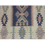 Small Kelim rug with all-over geometric design on an ivory ground