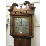 Late George III mahogany longcase clock with a swan neck pediment and flanking pilasters with a