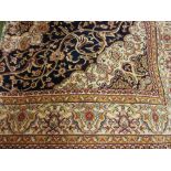 Kashan style machine woven blue ground carpet, 1.90 x 1.