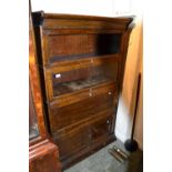 20th Century four section mahogany stacking bookcase with various panelled and glazed doors (one