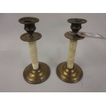 Pair of unusual 19th Century Chinese carved ivory and brass mounted candlesticks, 6.