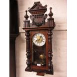 20th Century Vienna style wall clock, having turned and applied decoration with circular dial,
