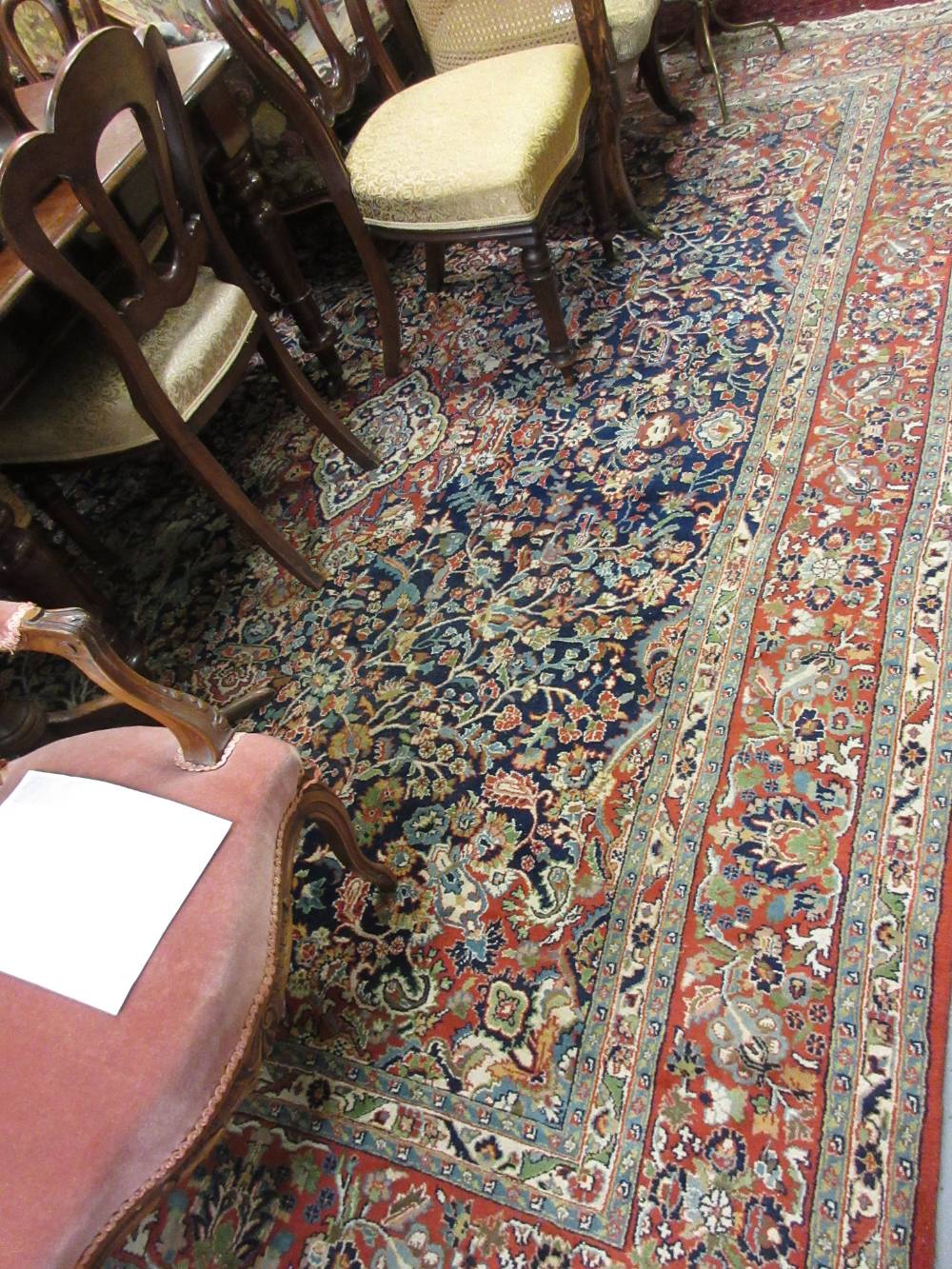 Large 20th Century Indo Persian carpet having all-over floral design with central medallion and