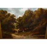 19th Century gilt framed oil on canvas, figure and seated child by a woodland path, 10.5ins x 14.
