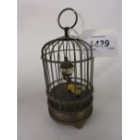 Small 20th Century brass bird cage table clock,