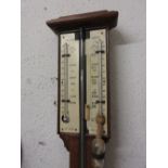 19th Century oak stick barometer, the ivory scale with single adjustable vernier, signed R.