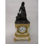 19th Century French gilt bronze mounted alabaster mantel clock with a dark brown patinated figural