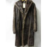 Ladies three quarter length mid brown fur coat and a matching hat