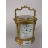 19th Century French matt gilded brass cased carriage clock of oval form,