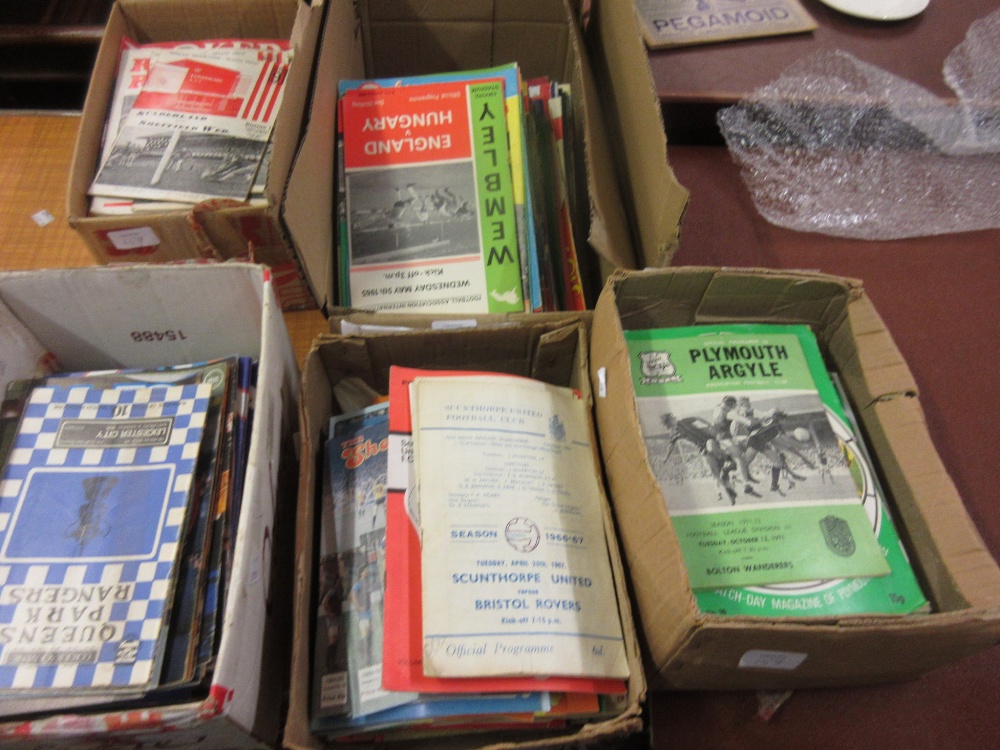 Five boxes containing a large quantity of a hundred plus football programmes including: England