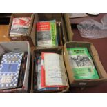 Five boxes containing a large quantity of a hundred plus football programmes including: England