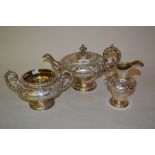 Early Victorian Scottish silver floral embossed three piece tea service, Edinburgh, 1843, maker J.