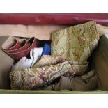 Box of various upholstery material including leather and an end of roll furniture fabric
