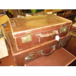 Early 20th Century tan leather suitcase with brass fittings together with a similar smaller case