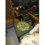 Pair of early Victorian rosewood kidney backed side chairs with needlepoint seats