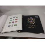 Two Davo albums containing a collection of U.S.A.