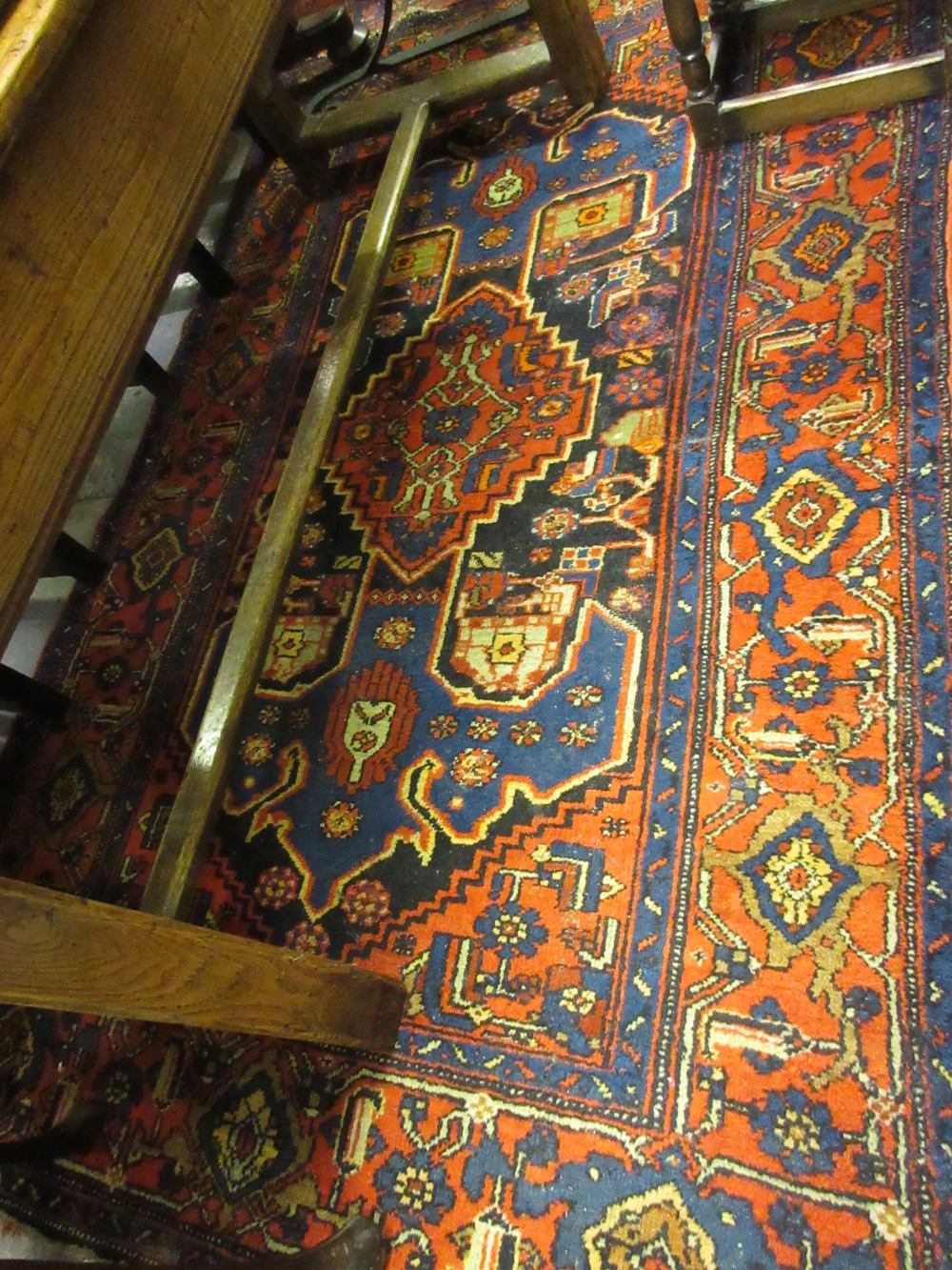 Hamadan rug with lobed medallion design on a deep and mid blue ground with borders,