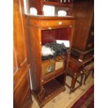 Early 20th Century mahogany filing cabinet with a single tambour door enclosing open shelves